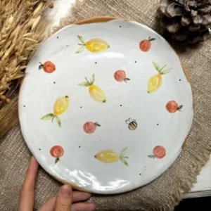 Тарелка с лимонами и яблочками